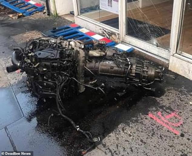 28030478-8285029-The_engine_was_also_thrown_from_the_vehicle_It_is_pictured_lying-a-3_15886892...jpg