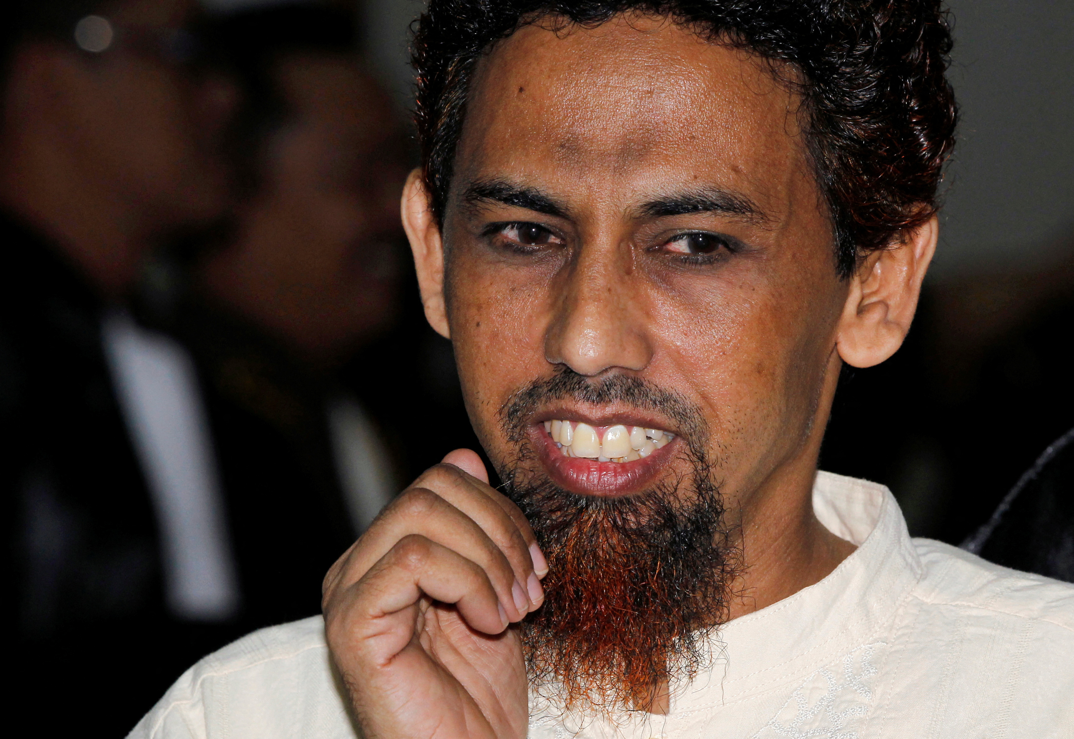Indonesian militant Patek walks after reading his final defence at the West Jakarta court