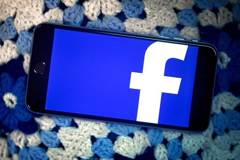 the Facebook logo on an iPhone 6 Plus
