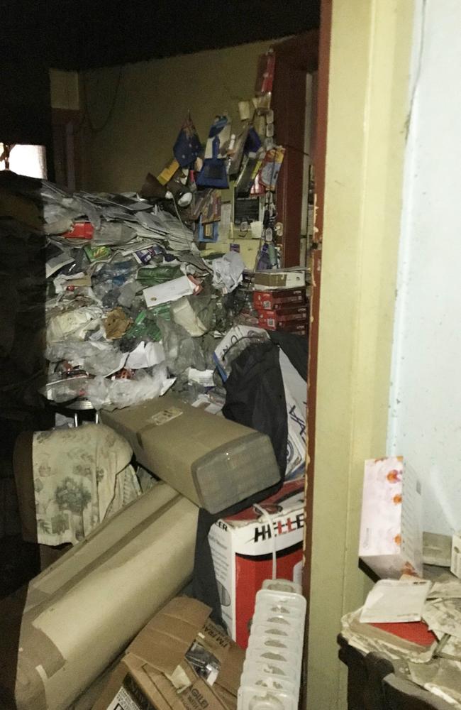 Hoarded mountain of rubbish stacked floor to ceiling inside hoarder and murderer Bruce Roberts’ Greenwich home.