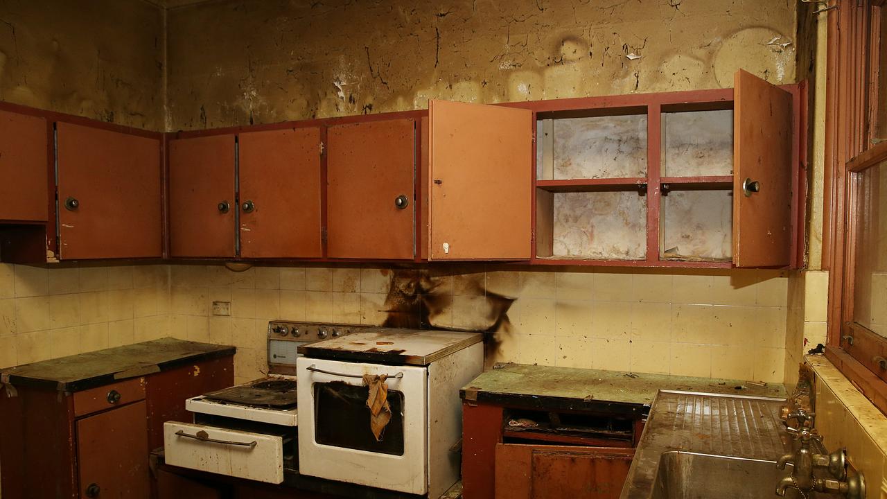 The kitchen inside the Greenwich home after piles of hoarded rubbish were cleared following the discovery of a second body.