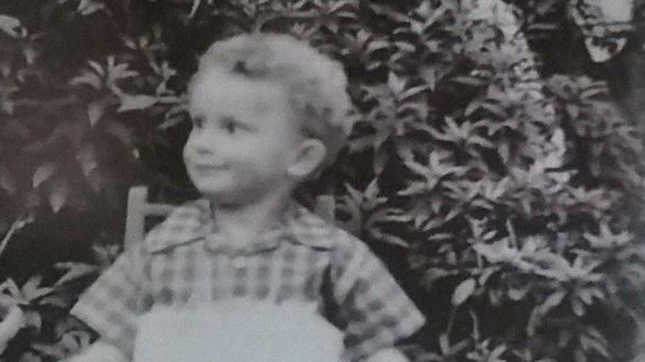 Bruce Roberts, (above) as a young boy in Coonabarabran, grew up with a gun obsession and became a reclusive hoarder.